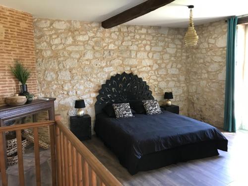 Postel nebo postele na pokoji v ubytování Logis de Chaumiac