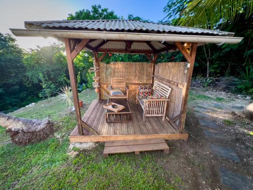 Zahrada ubytování Gîte Bleu Caraïbes - Vue mer