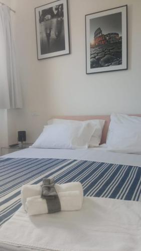 Ένα ή περισσότερα κρεβάτια σε δωμάτιο στο SottoVento