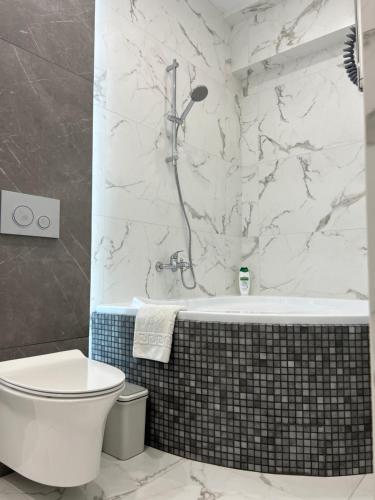 Ванная комната в Аппартаменты DELUXE на Соборной