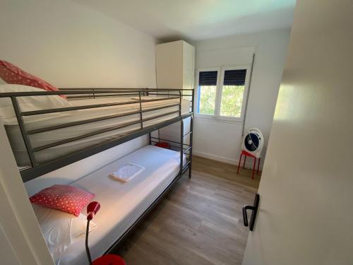 A bed or beds in a room at Mas Pinell 31C
