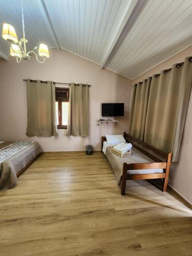 Katil atau katil-katil dalam bilik di Hotel Fazenda Upã Moña
