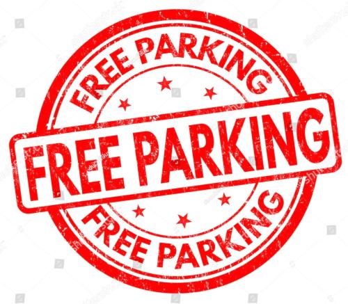 a red rubber stamp with the word free parking at Krumlovský Vltavín in Český Krumlov