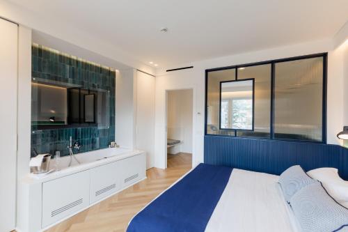 Postel nebo postele na pokoji v ubytování Grand Hotel Cesare Augusto