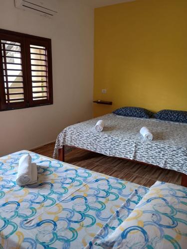 Ένα ή περισσότερα κρεβάτια σε δωμάτιο στο B&B Pedra do Meio
