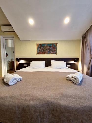 Llit o llits en una habitació de Lea Guest House