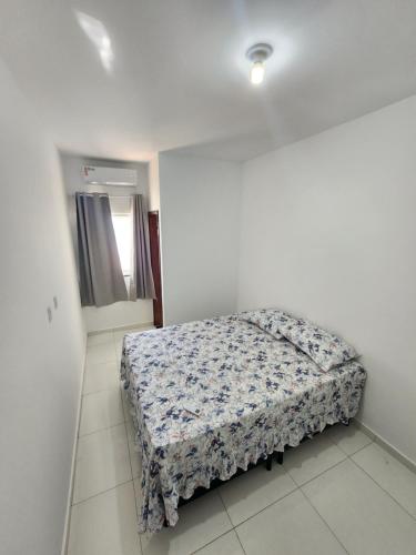 Katil atau katil-katil dalam bilik di Residência em Guarajuba 09