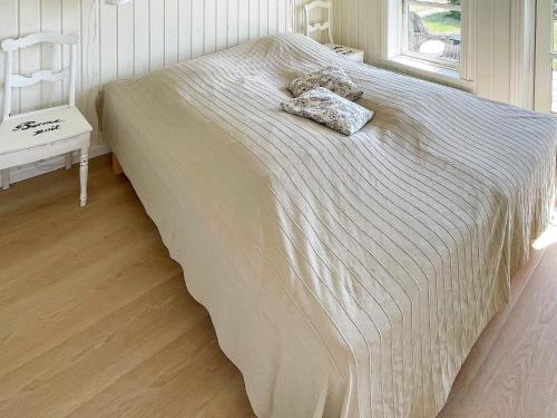 Ένα ή περισσότερα κρεβάτια σε δωμάτιο στο 8 person holiday home in Broager-By Traum