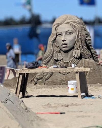 a sand sculpture of a bust of a woman at Pacific Forest Beach House in Parksville