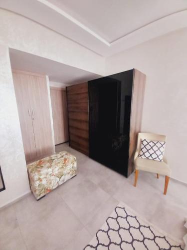 Katil atau katil-katil dalam bilik di Superbe Appartement Bouskoura
