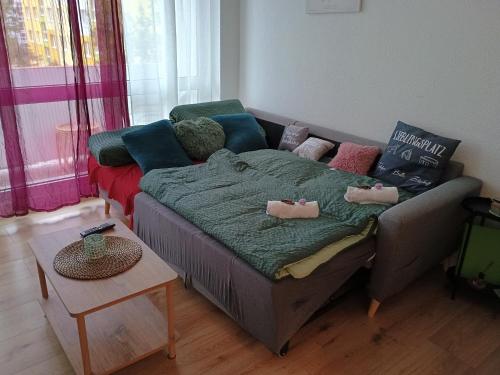 a bed with two stuffed animals on it in a room at Familien Urlaub!!!!! in Coswig