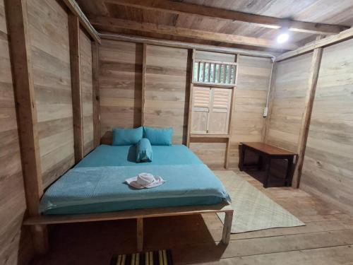 Ένα ή περισσότερα κρεβάτια σε δωμάτιο στο Baho Farm Stay