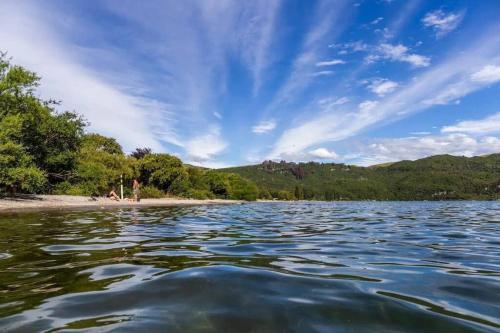 a view from the water of a body of water at The Fantail Couples Retreat in Kinloch