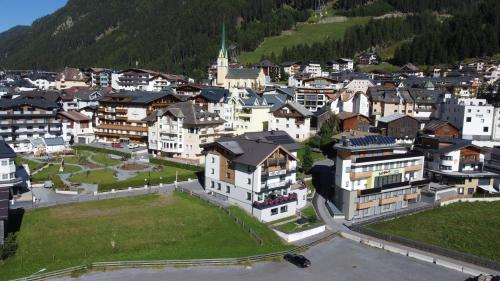 an aerial view of a small town with buildings at Hotel Garni Helvetia in Ischgl