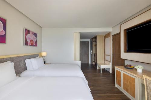 Cama o camas de una habitación en Dusit Thani Mactan Cebu Resort