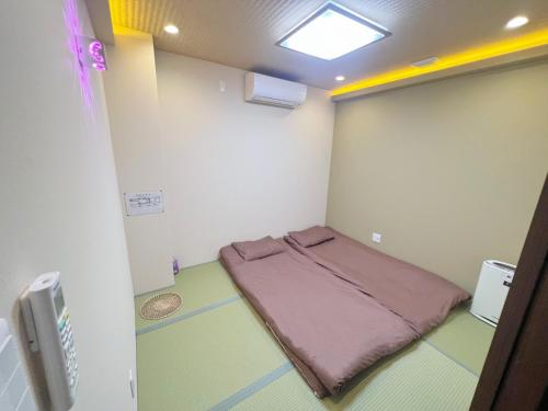 Voodi või voodid majutusasutuse 二室一厅-大阪中心-心斋桥-难波-梅田-USJ-日本桥-大阪城公园-京都神户奈良-地铁站200m toas