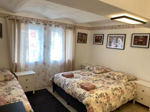Postel nebo postele na pokoji v ubytování Hotel Adriana