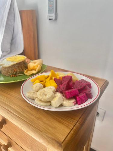 a plate of food on top of a table at Palma House Kelingking in Nusa Penida