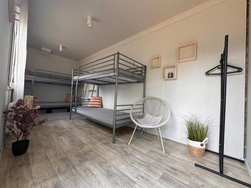 Postel nebo postele na pokoji v ubytování Camp Hostel