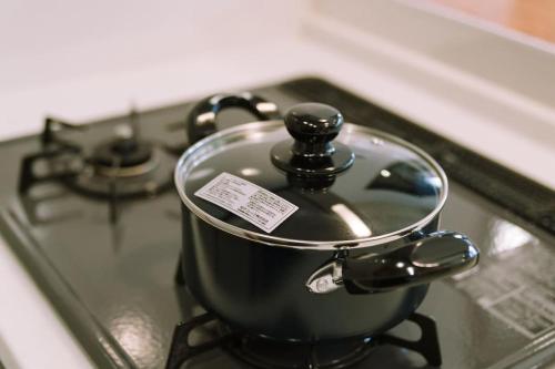 a pot sitting on top of a stove at DAHARA s-3 in Minami Aso