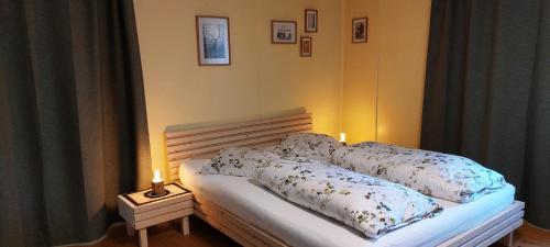 Postel nebo postele na pokoji v ubytování BnB Elsenerhaus
