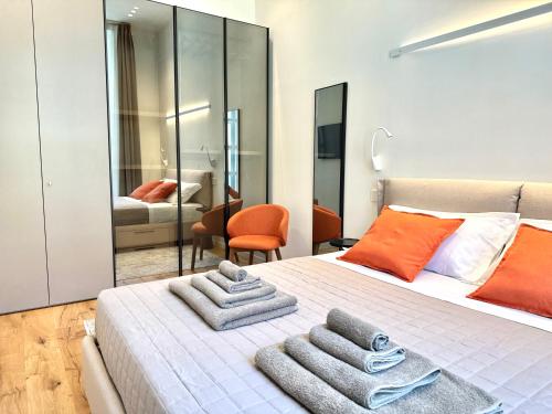 Giường trong phòng chung tại SAVOY Luxury Apartment CITY CENTER