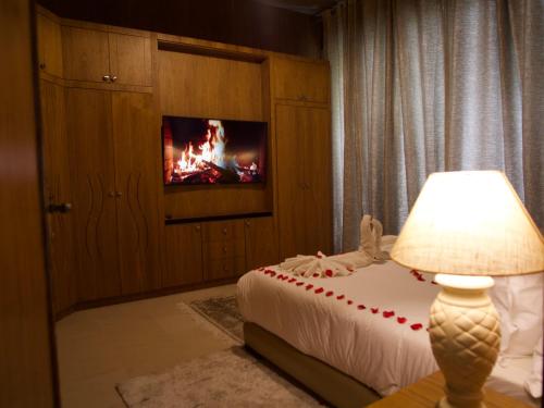Una cama o camas en una habitación de Sillage Palace Sky & Spa