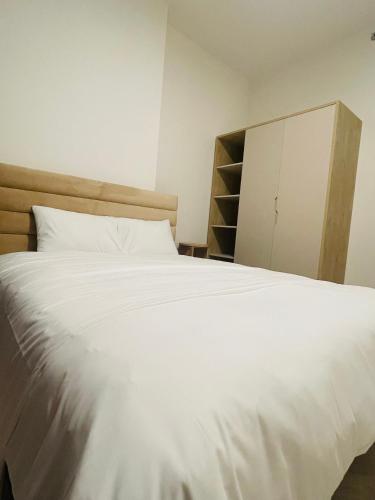 Postel nebo postele na pokoji v ubytování Masteri Center Point- HOMESAY ADORA