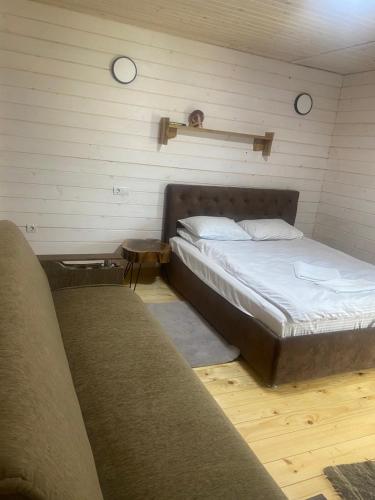 Postel nebo postele na pokoji v ubytování Chalet Ivanna