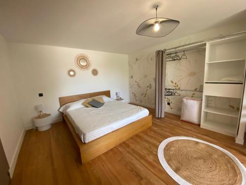 Postel nebo postele na pokoji v ubytování Maison du bonheur