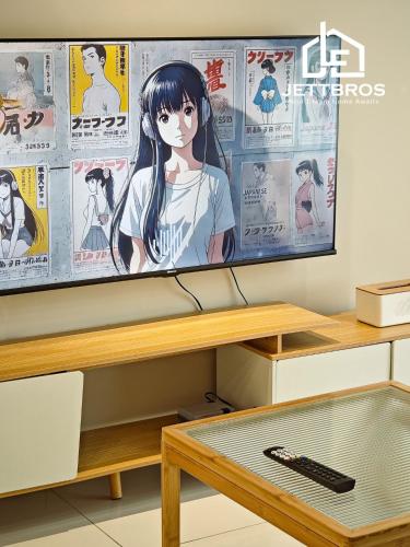 a flat screen tv hanging on a wall at D' Summit Residence By JettBros Johor Bahru in Johor Bahru