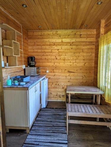 Kuchyň nebo kuchyňský kout v ubytování Rehe Turismitalu