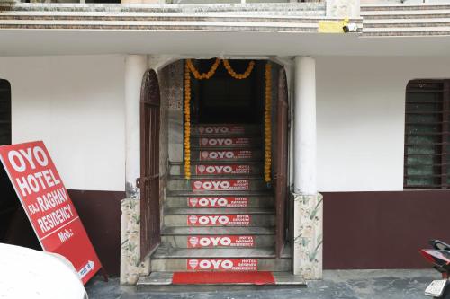 a door to a temple with a sign in front at Hotel O Raghav Residency in Ghaziabad