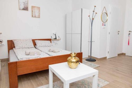 Postel nebo postele na pokoji v ubytování Charm apt-Sarajevo Center- Aircondition