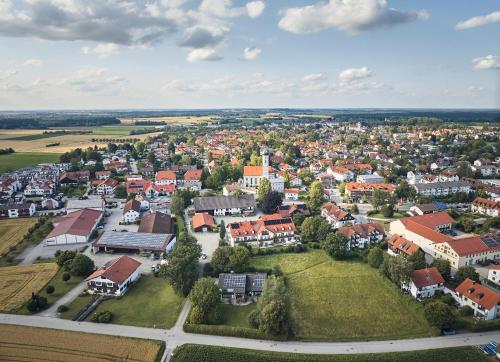 an aerial view of a town with houses at Glasl's Landhotel in Zorneding