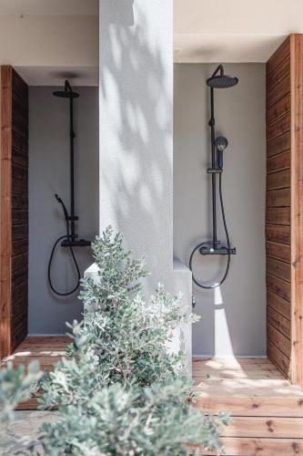 a house with a christmas tree in the entry way at NIMA Village in Paleros