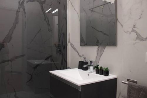 Ένα μπάνιο στο Villa Nina - Lussuosa Villa con piscina privata a Stintino