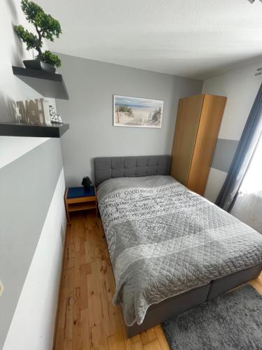 Postel nebo postele na pokoji v ubytování Stral-Sund