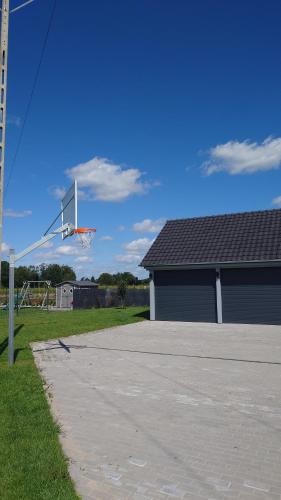 a basketball hoop in front of a building at Bukowska House in Sulechów