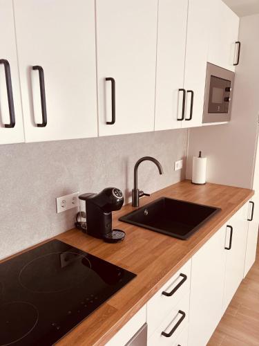 El HierroStay Appartments - La Chalana & El Remoにあるキッチンまたは簡易キッチン