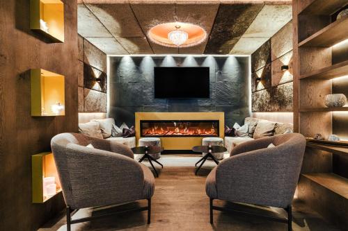 Posezení v ubytování Hotel Alpina