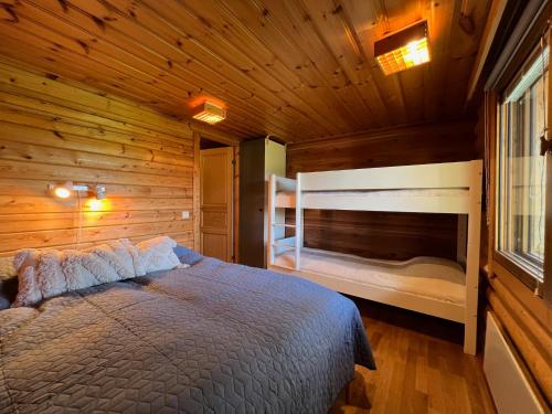 Vuode tai vuoteita majoituspaikassa Logcabin, sauna, fireplace, view, kitchen