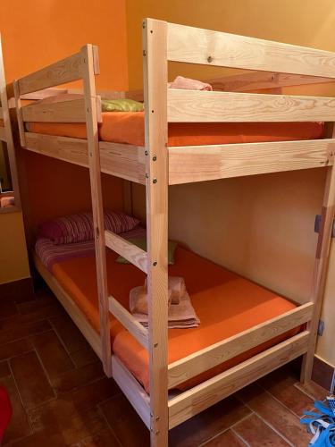 a set of bunk beds in a room at 18th Century Samnium Stone Residence in Alfedena