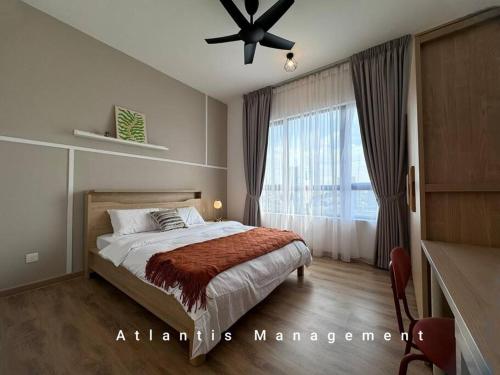 a bedroom with a bed and a ceiling fan at Sungai Besi, Uno Promenade, Nearby Bukit Jalil & Salak Selatan MRT by Atlantis Management in Kuala Lumpur