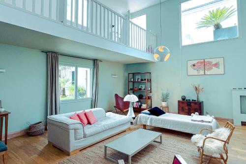 En eller flere senge i et værelse på L'insoupçonnée sur le port de Vannes