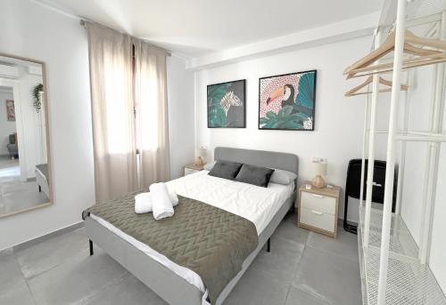 Postel nebo postele na pokoji v ubytování Mezquita Apartamento