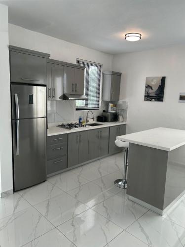 Cuina o zona de cuina de Level suites Penthouse
