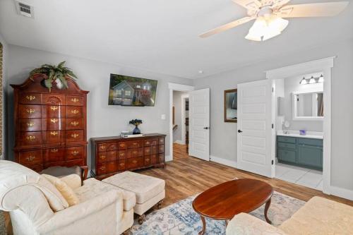 a living room with a couch and a table at Multi-gen Family Mountain House in Front Royal