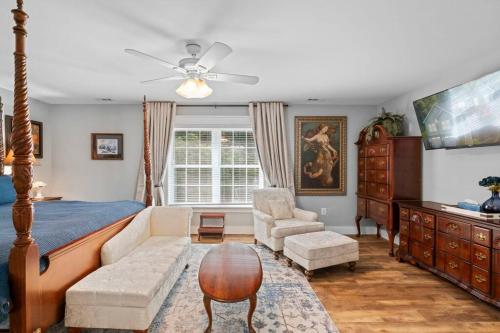 a bedroom with a bed and a living room at Multi-gen Family Mountain House in Front Royal