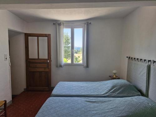 Postel nebo postele na pokoji v ubytování La Bastideta,